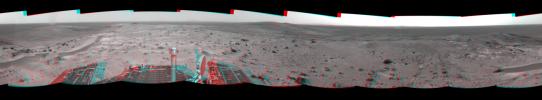 This anaglyph from NASA's Mars Exploration Rover, Spiriti, was taken from the summit of 'Husband Hill,' three dust devils are clearly visible in the plains of Gusev Crater. 3D glasses are necessary to view this image.