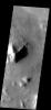 The mottled surface texture and flow features observed in this NASA Mars Odyssey image suggest materials may be, or have been, mixed with ice. There is also evidence in some areas for infilling of sediments as crater rims and ridges appear covered.
