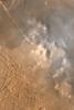 NASA's Mars Global Surveyor shows dust-raising events -- small dust storms and a few very large dust devils in the Syria/Claritas region of Mars.