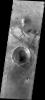 This image taken by NASA's 2001 Mars Odyssey shows lava flows from the broad shield volcano Syrtis Major have poured into the Isidis Basin to the east on Mars.
