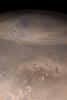 NASA's Mars Global Surveyor shows an eastward-moving dust storm on the plains north of Cydonia and western Arabia Terra on Mars.