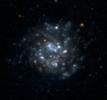 NASA's Galaxy Evolution Explorer took this ultraviolet color image of the galaxy NGC5474 on June 7, 2003. NGC5474 is located 20 million light-years from Earth and is within a group of galaxies dominated by the Messier 101 galaxy.