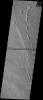 NASA's Mars Odyssey spacecraft captured this image in August 2003, showing part of the western flank of Arsia Mons, the southernmost of the three great Tharsis Montes on Mars. The surface shows parallel ridges.