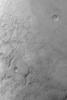 NASA's Mars Global Surveyor shows Hellas Planitia on Mars, the floor of a giant basin that originally formed by the impact of a large comet or asteroid.