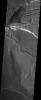 Bold scarps and extensional features (grabens) record multiple stages of caldera collapse at the summit of Olympus Mons. The wrinkle ridges are contractional feature. This image was captured by NASA's Mars Odyssey spacecraft in October 2003.
