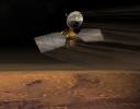 NASA's Mars Reconnaissance Orbiter dips into the thin martian atmosphere to adjust its orbit in this artist's concept illustration.