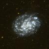 This image of the nearby spiral galaxy NGC 300 was taken by NASA's Galaxy Evolution Explorer in a single orbit exposure of 27 minutes on October 10, 2003.