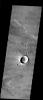 This image from NASA's 2001 Mars Odyssey released on Dec 18, 2003 shows fairly rare asymmetric craters. The more typical symmetric craters are formed when meteors impact a surface over a wide range of angles.
