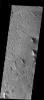 This image from NASA's 2001 Mars Odyssey released on Dec 19, 2003 shows a strange erosional pattern differing greatly from the surrounding terrain of Lycus Sulchi.