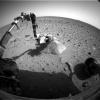 NASA's Mars Exploration Rover Spirit shows its robotic arm extended to the rock called Adirondack.