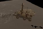 This image is a still from a computer-generated animation showing NASA's Mars Exploration Rover inspecting the rock dubbed Stone Mountain with its instrument deployment device, or arm. 
