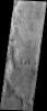 This image captured on 13 April 2003 by NASA's 2001 Mars Odyssey, shows an area to the west of Mars Exploration Rover Opportunity's landing spot on Meridiani Planum.