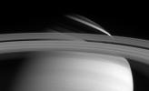 Saturn's rings cast threadlike shadows on the planet's northern hemisphere. Note the translucent C ring, and thin outermost F ring. The image was taken with NASA's Cassini narrow angle camera in visible light on May 10, 2004.