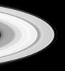 This image captured by NASA's Cassini spacecraft shows Saturn's moon Prometheus orbiting inside the planet's F-ring, which exhibits some of the knotted structure for which it is renowned.