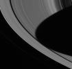 The dark shadow of Saturn's southern hemisphere spreads across the planet's rings all the way to the Encke gap. This image was captured by NASA's Cassini spacecraft narrow angle camera on June 21, 2004.