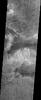 This image, part of an images as art series from NASA's 2001 Mars Odyssey released on March 5, 2004 shows a martian landscape resembling a guppy.