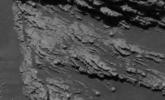 This image from NASA's Mars Exploration Rover Opportunity shows a close-up of texture interpreted as cross-lamination evidence that sediments forming the rock were laid down in flowing water on Mars' Meridiani Planum.