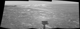 This image shows NASA's Mars Exploration Rover Opportunity sitting along the rim of 'Endurance Crater' on Mars on May 13, 2004.