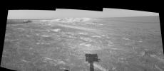 This image shows NASA's Mars Exploration Rover Opportunity sitting along the rim of 'Endurance Crater' on Mars on May 13, 2004.