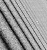 This image shows a close-up view of a density wave in Saturn's A ring. It was taken by the narrow angle camera on NASA's Cassini spacecraft after successful entry into Saturn's orbit.