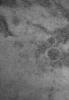 NASA's Mars Global Surveyor shows a spotted, high latitude plain, south of the Argyre basin on Mars.