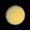 A global detached haze layer and discrete cloud-like features high above Titan's northern terminator (day-night transition) are visible in this image acquired by NASA's Cassini spacecraft.