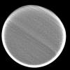 This image captured by NASA's Cassini spacecraft was taken during Cassini's very close approach to Titan on Dec. 13, 2004. The view shows pronounced banding in the Titan atmosphere.