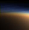 This natural color image from NASA's Cassini spacecraft shows Titan's upper atmosphere -- an active place where methane molecules are being broken apart by solar ultraviolet light and the byproducts combine to form compounds like ethane and acetylene.