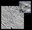 The tortured southern polar terrain of Saturn's moon Enceladus appears strewn with great boulders of ice in these two fantastic views -- the highest resolution images obtained so far by NASA's Cassini spacecraft of any world.