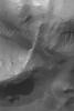 NASA's Mars Global Surveyor shows gullies and dunes in a crater near Gorgonum Chaos was acquired in late May 2004.