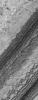 This image from NASA's Mars Global Surveyor from Sept. 2005, shows details among some of the eroded layer outcrops of the martian south polar region. Much of the south polar region of Mars is covered by a thick unit of layered material.