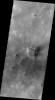 This image released on July 8, 2004 from NASA's 2001 Mars Odyssey shows dust carried aloft by the wind has settled out on every available surface creating sand dunes on Mars.