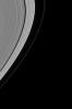 This image captured by NASA's Cassini spacecraft shows Saturn's moon Prometheus shepherding the inner edge of Saturn's F ring.
