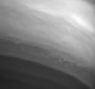 This close-up of Saturn's atmosphere shows turbulent activity on the ragged edge of the equatorial cloud band, as captured in this image from NASA's Cassini spacecraft.