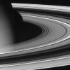 NASA's Cassini spacecraft pierced the ring plane and rounded Saturn on Oct. 27, 2004, capturing this view of the dark portion of the rings.