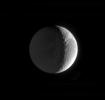 This image captured by NASA's Cassini spacecraft shows the night side of Saturn's moon Dione on Feb. 18, 2005.