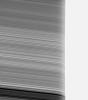 Saturn's rings appear strangely warped in this view of the rings seen through the upper Saturn atmosphere. This image from NASA's Cassini spacecraft was obtained using a near-infrared filter.