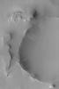 NASA's Mars Global Surveyor shows dark slope streaks, a common feature on slopes thickly-mantled by dust, especially in the Tharsis, Arabia, and western Amazonis regions of Mars.