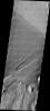 This image released on July 22, 2004 from NASA's 2001 Mars Odyssey shows that eons of atmospheric dust storm activity has left its mark on the surface of Mars such as wind eroded landforms that can be covered by later materials.
