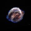 The images indicate that the bubble of gas that makes up the supernova remnant appears different in various types of light. Chandra reveals the hottest gas [colored blue and colored green], which radiates in X-rays.