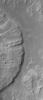 NASA's Mars Global Surveyor shows the distal (far) end of a landslide deposit in Coprates Chasma, part of the vast Valles Marineris trough system on Mars. Large boulders, the size of buildings, occur on the landslide surface.