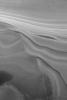 NASA's Mars Global Surveyor shows some of Mars' north polar layers exposed on a slope.