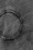 NASA's Mars Global Surveyor shows a crater's raised rim still pokes out above the surrounding plains on Mars.