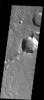 This image released on Nov 30, 2004 from NASA's 2001 Mars Odyssey shows small unnamed channel just west of the large outflow region of Ares, Simud, and Tiu Valles on Mars.