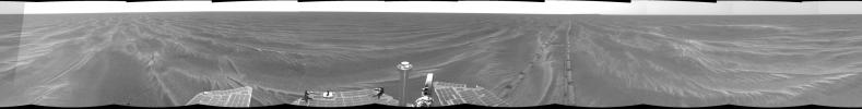 NASA's Mars Exploration Rover Opportunity took this 360-degree panorama in 2005 after Opportunity had driven 64 meters (209 feet) on sol 381 to arrive at this location close to a small crater dubbed 'Alvin.'