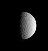 The story of the solar system is written upon the faces of its many worlds, such as Saturn's icy moon Rhea, seen here in an image captured by NASA's Cassini spacecraft.