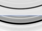 Saturn's moon Pan is seen here orbiting within the Encke Gap in Saturn's A ring in two differently processed versions of the same image from NASA's Cassini spacecraft.