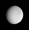 Saturn's icy moon Tethys displays a very old impact basin here, just southeast of its giant canyon system, Ithaca Chasma. This image was taken in visible light with NASA's Cassini spacecraft's narrow-angle camera on May 20, 2005.