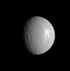 Saturn's moon Rhea displays two large impact features here, along the terminator (the boundary between day and night), plus a superb rayed crater to the east. This image was taken in visible light with NASA's Cassini spacecraft's narrow-angle camera.