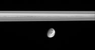 This image captured by NASA's Cassini spacecraft shows the soft appearance of Dione's wispy terrains belies their true nature. They are, in fact, complex systems of crisp, braided fractures that cover the moon's trailing hemisphere.